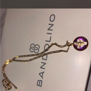 Gold Necklace with Vibrant Purple stoned gold cross Pendant